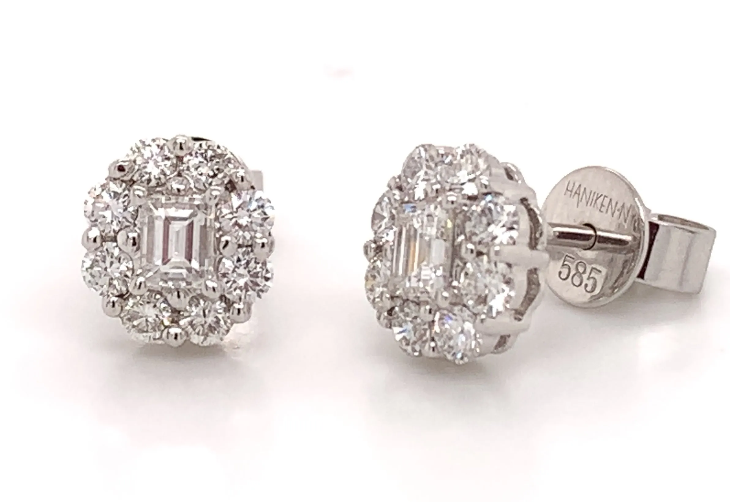 0.94CT T.W. Diamond Emerald Cut Halo Studs