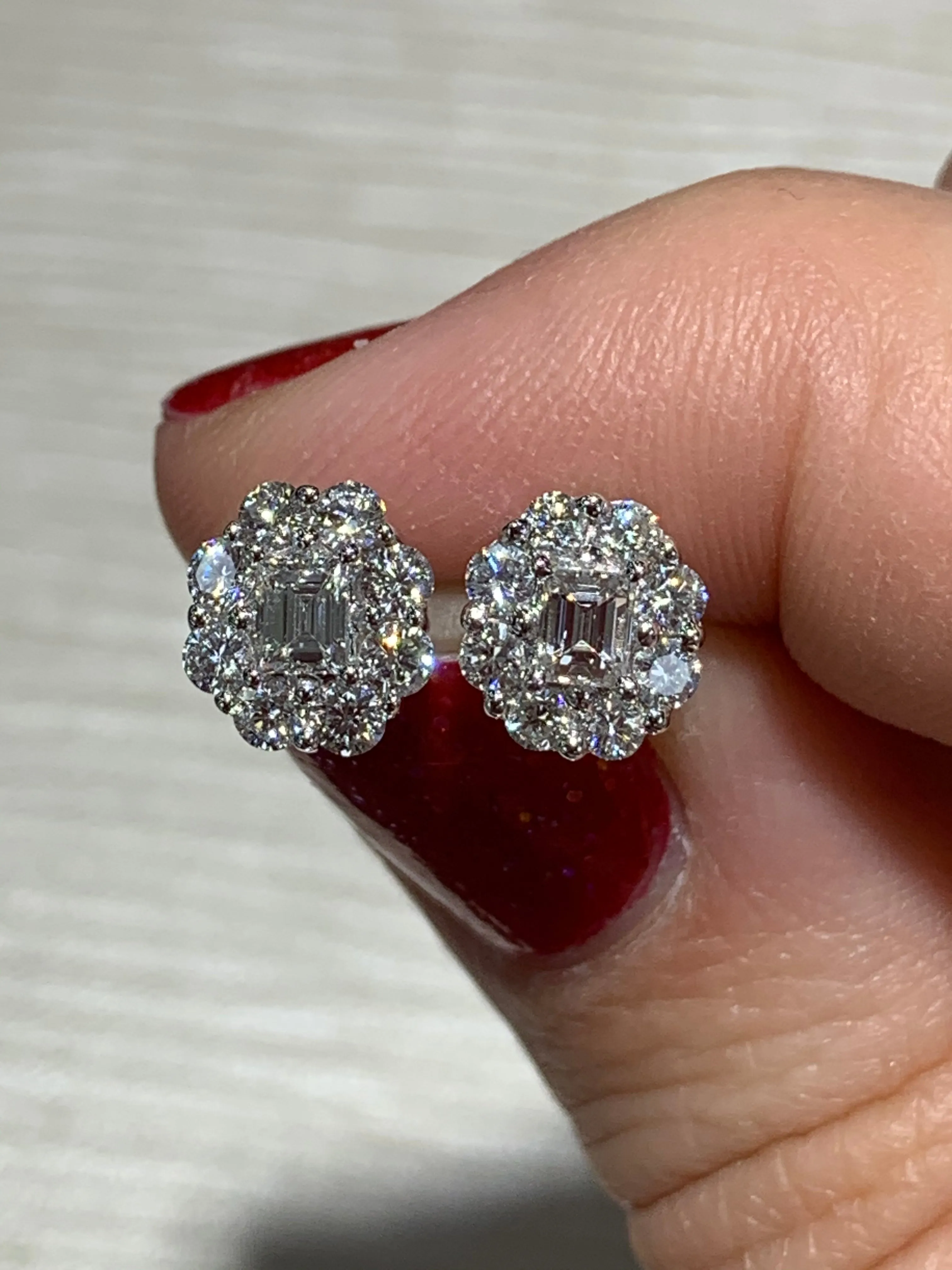 0.94CT T.W. Diamond Emerald Cut Halo Studs