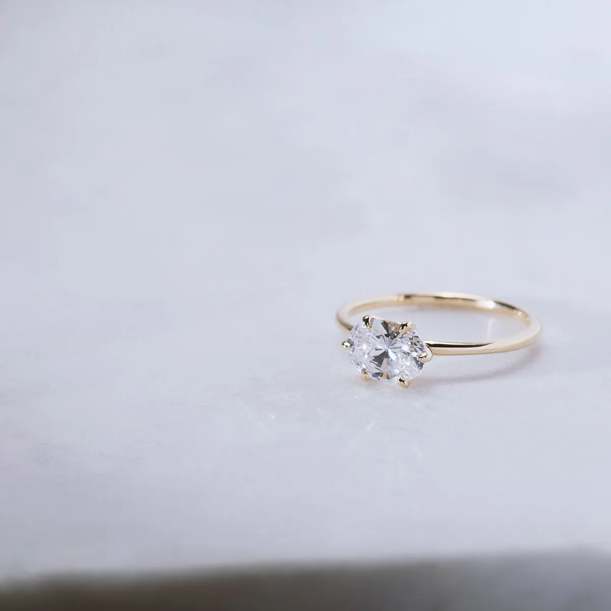 18K Gold "Pixie" Hidden Halo Ring Mount with East/West Stone
