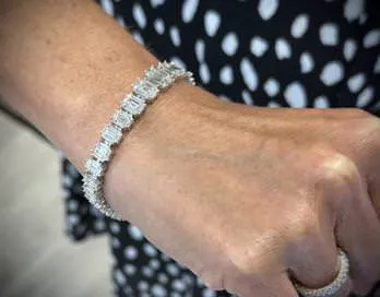 18k Invisibly set Baguette Cut Diamond Bracelet
