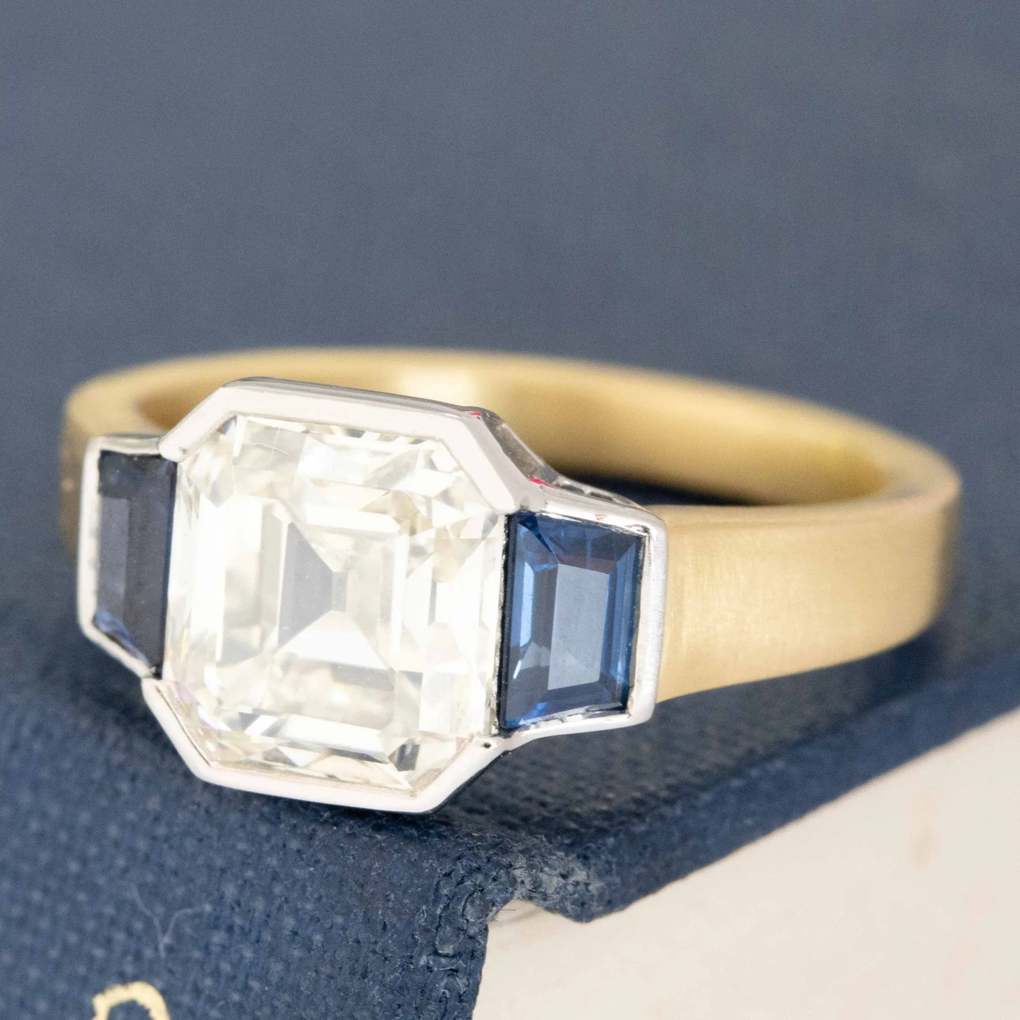 2.66ct Asscher Cut Diamond & Sapphire Trilogy Ring, GIA M SI2