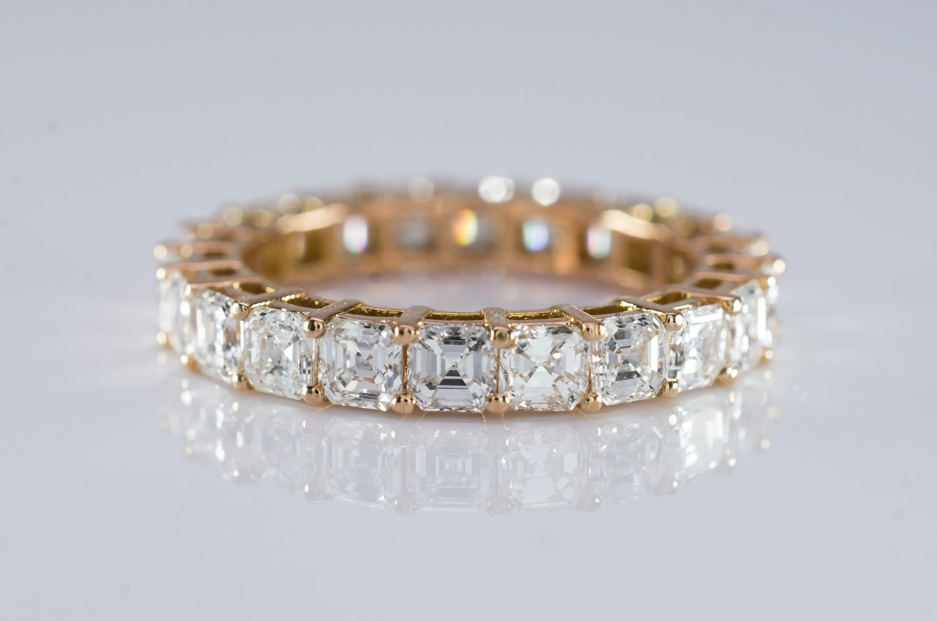 3.2CTW ASSCHER CUT ETERNITY 18K GOLD
