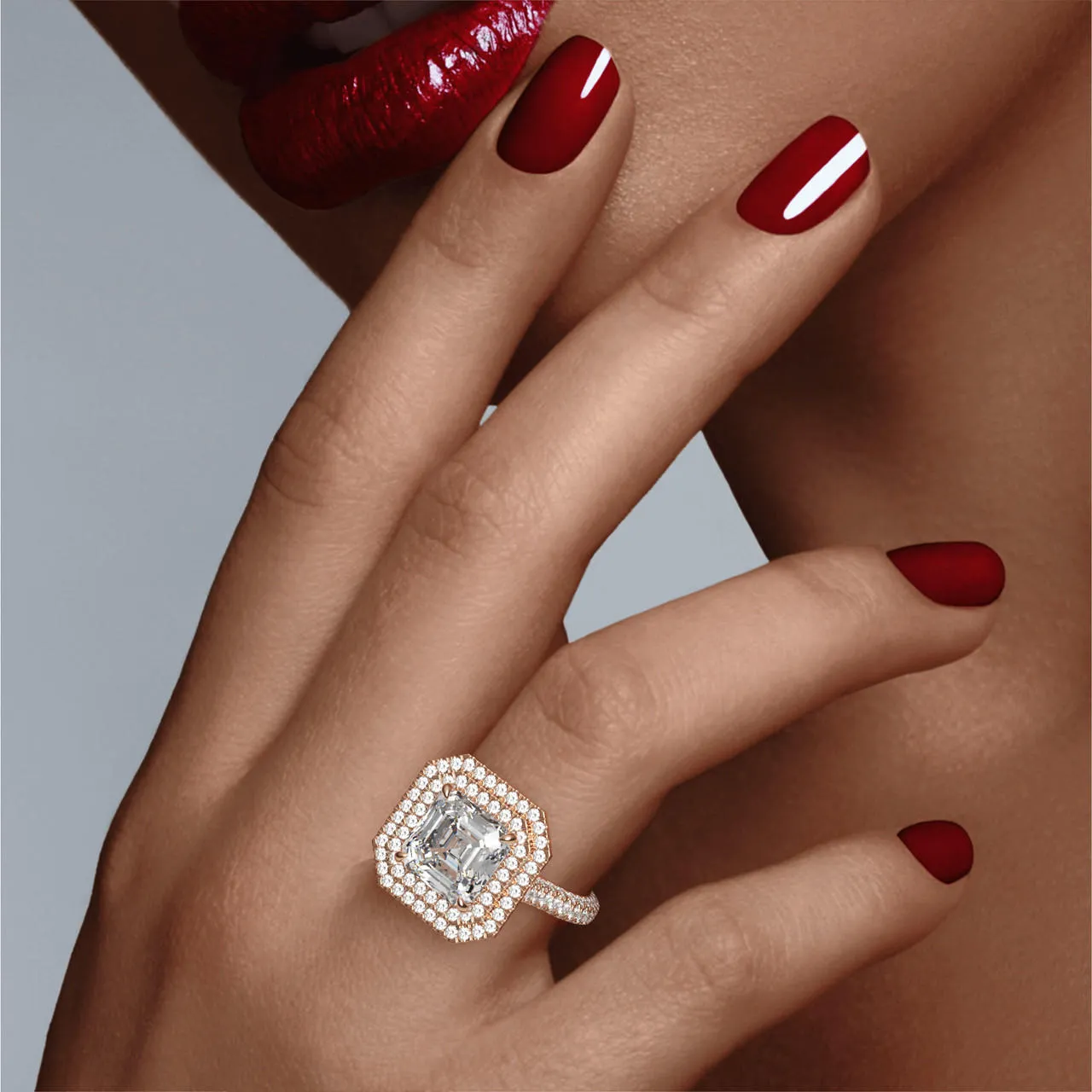 ASSCHER CUT DIAMOND ENGAGEMENT RING WITH A DOUBLE HALO THREE PHASES TRIPLE PAVE SETTING IN 18K ROSE GOLD