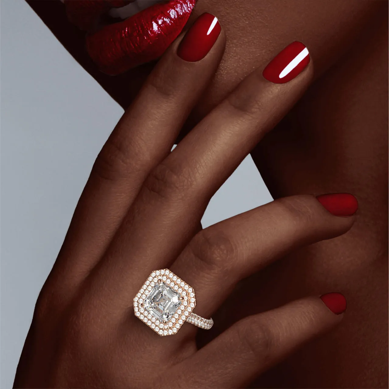 ASSCHER CUT DIAMOND ENGAGEMENT RING WITH A DOUBLE HALO THREE PHASES TRIPLE PAVE SETTING IN 18K ROSE GOLD