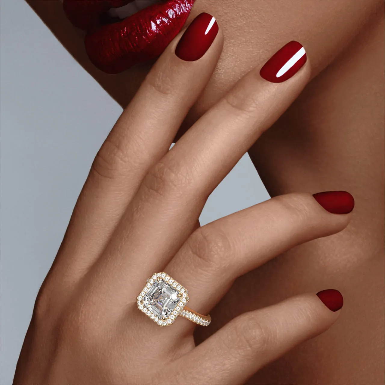 ASSCHER CUT DIAMOND ENGAGEMENT RING WITH A WRAPPED HALO THREE PHASES PAVE SETTING IN 18K YELLOW GOLD