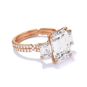 EMERALD CUT DIAMOND ENGAGEMENT RING WITH A THREE STONE CHANCE PAVE SETTING IN 18K ROSE GOLD