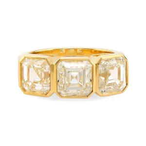 GIA 6.02 carat total weight Asscher cut diamond 18k yellow gold three stone ring
