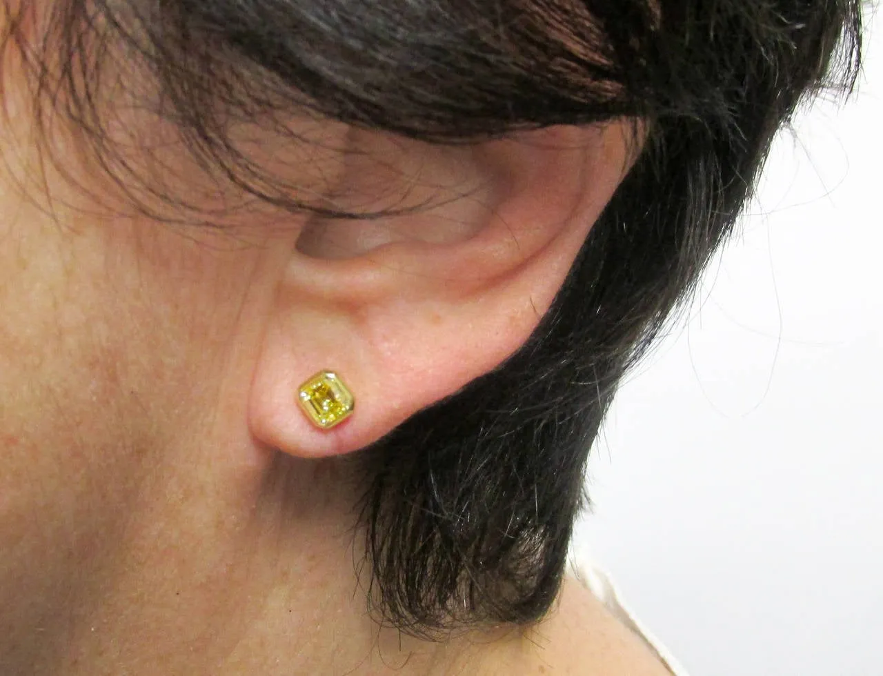 GIA Certified Natural Fancy Intense Yellow Emerald Cut Diamond Stud Earrings