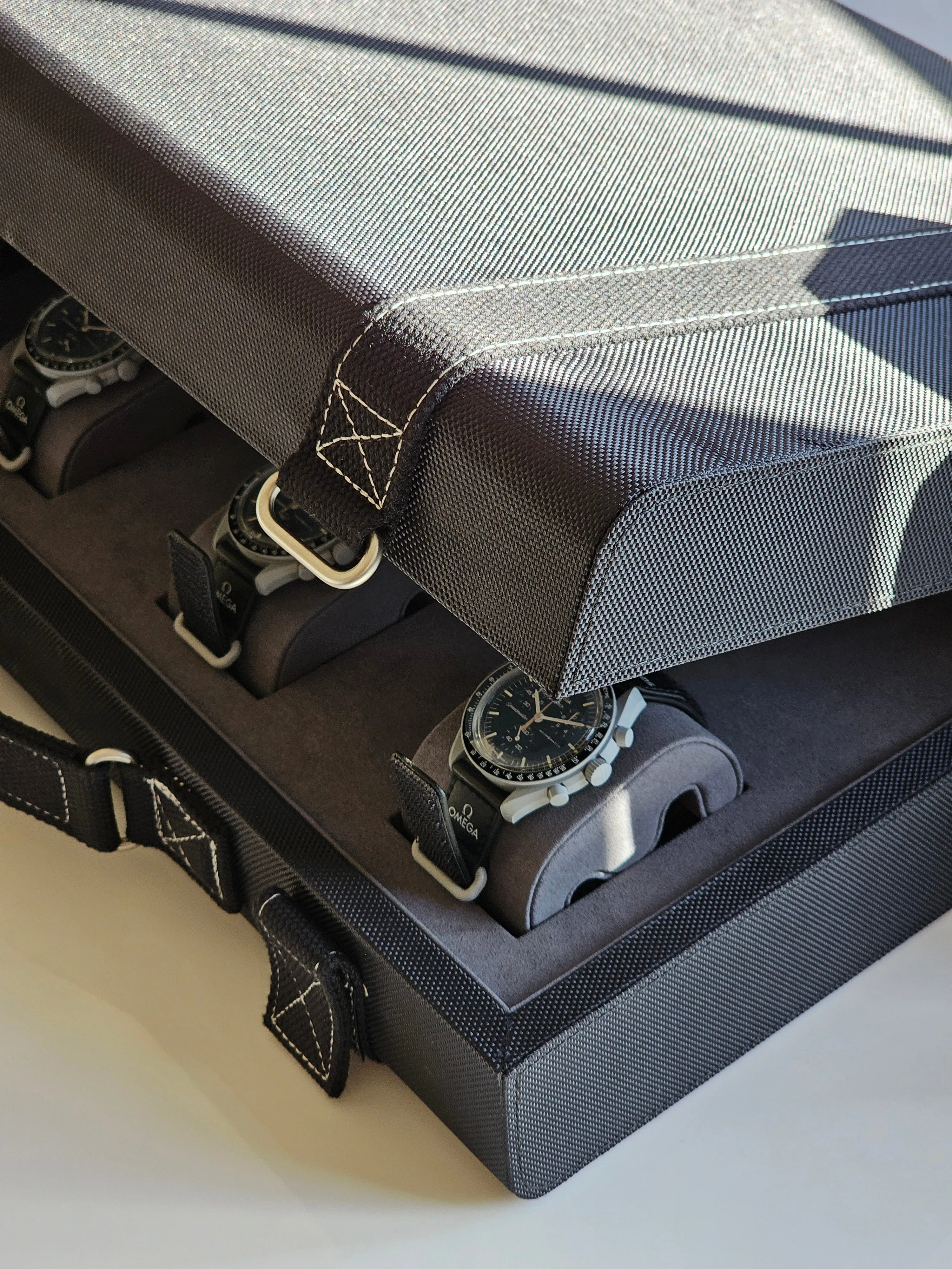 Omega X Swatch MoonSwatch Flight Case: All 11 MoonShines - Black Edition