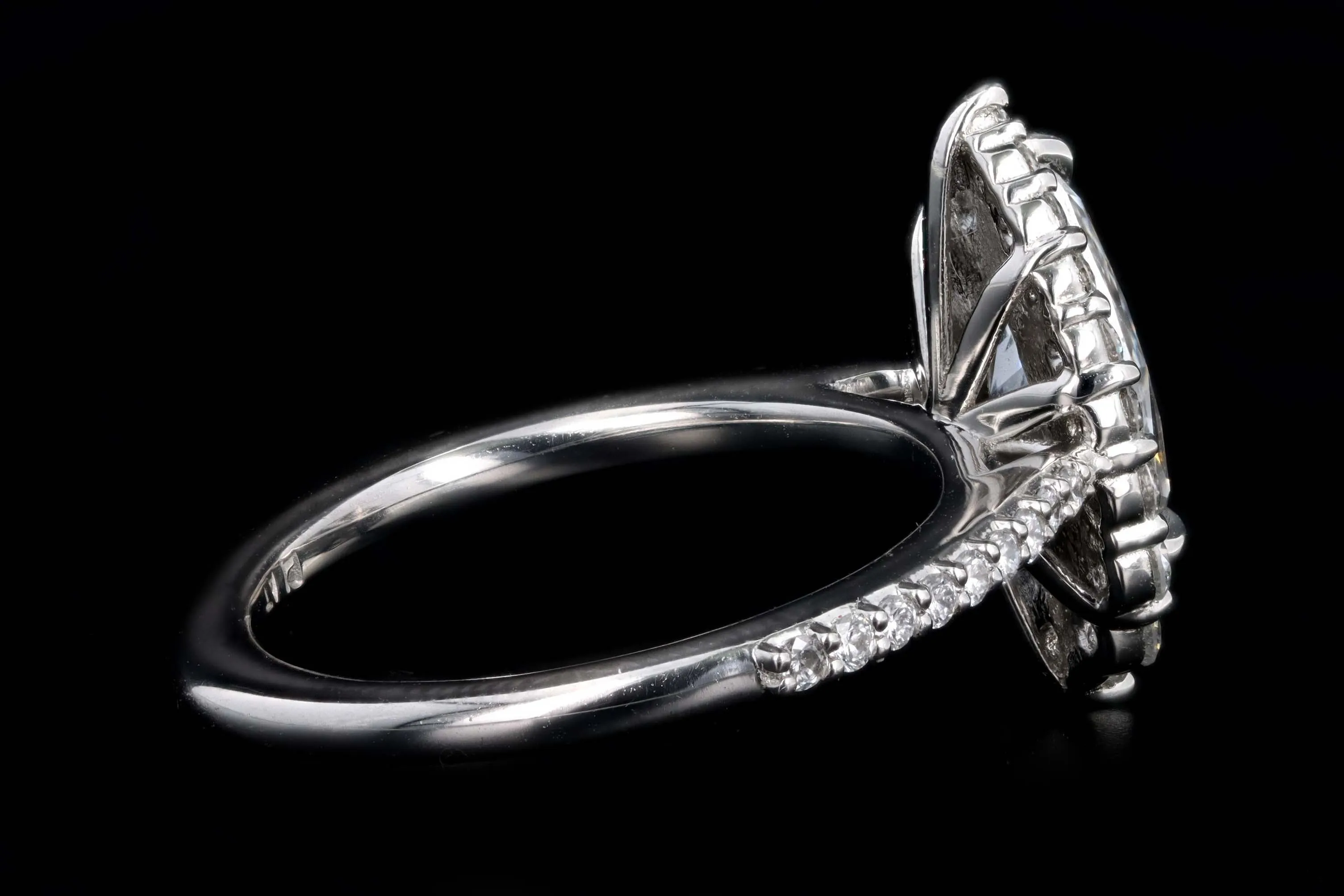 Platinum 1.63 Carat Pear Cut Diamond Graduated Halo Engagement Ring GIA Certified
