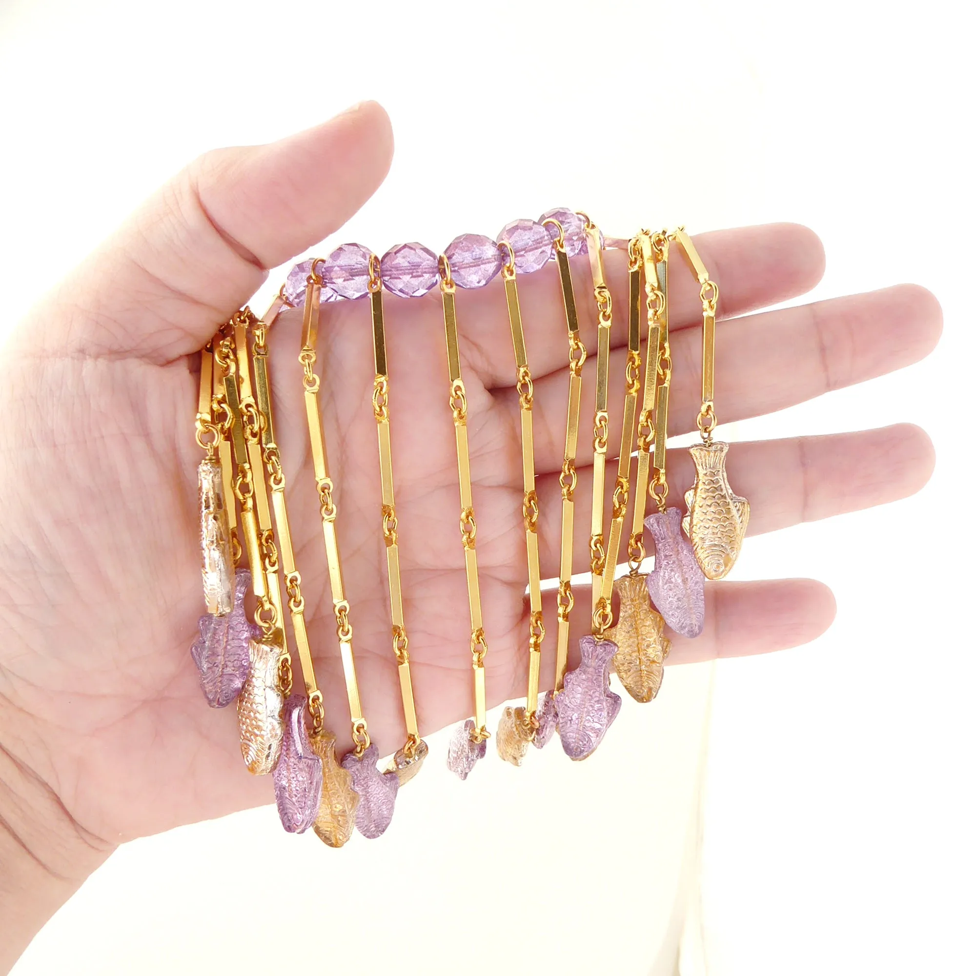 Purple metallic fish necklace