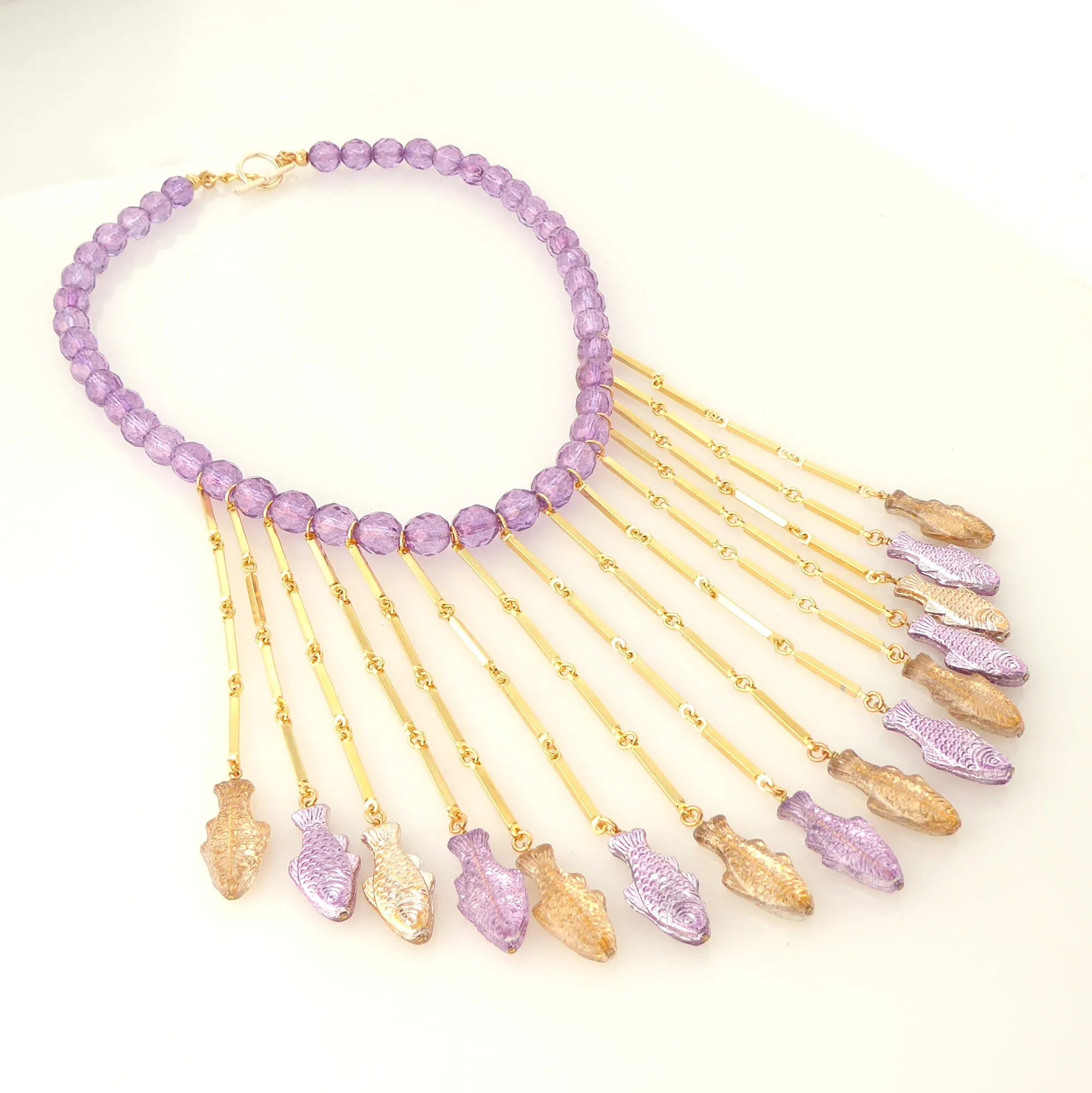Purple metallic fish necklace