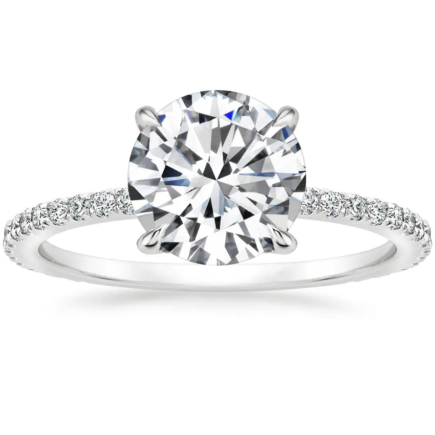 THREE STONE RADIANT CUT ENGAGEMENT RING WITH TRILLION CUT DIAMONDS