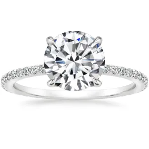 THREE STONE RADIANT CUT ENGAGEMENT RING WITH TRILLION CUT DIAMONDS