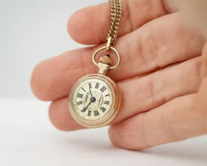 Tiny women's watch necklace vintage pendant Seagull, gold plated Roman numerals watch on neck gift, women watch on chain delicate sunburst