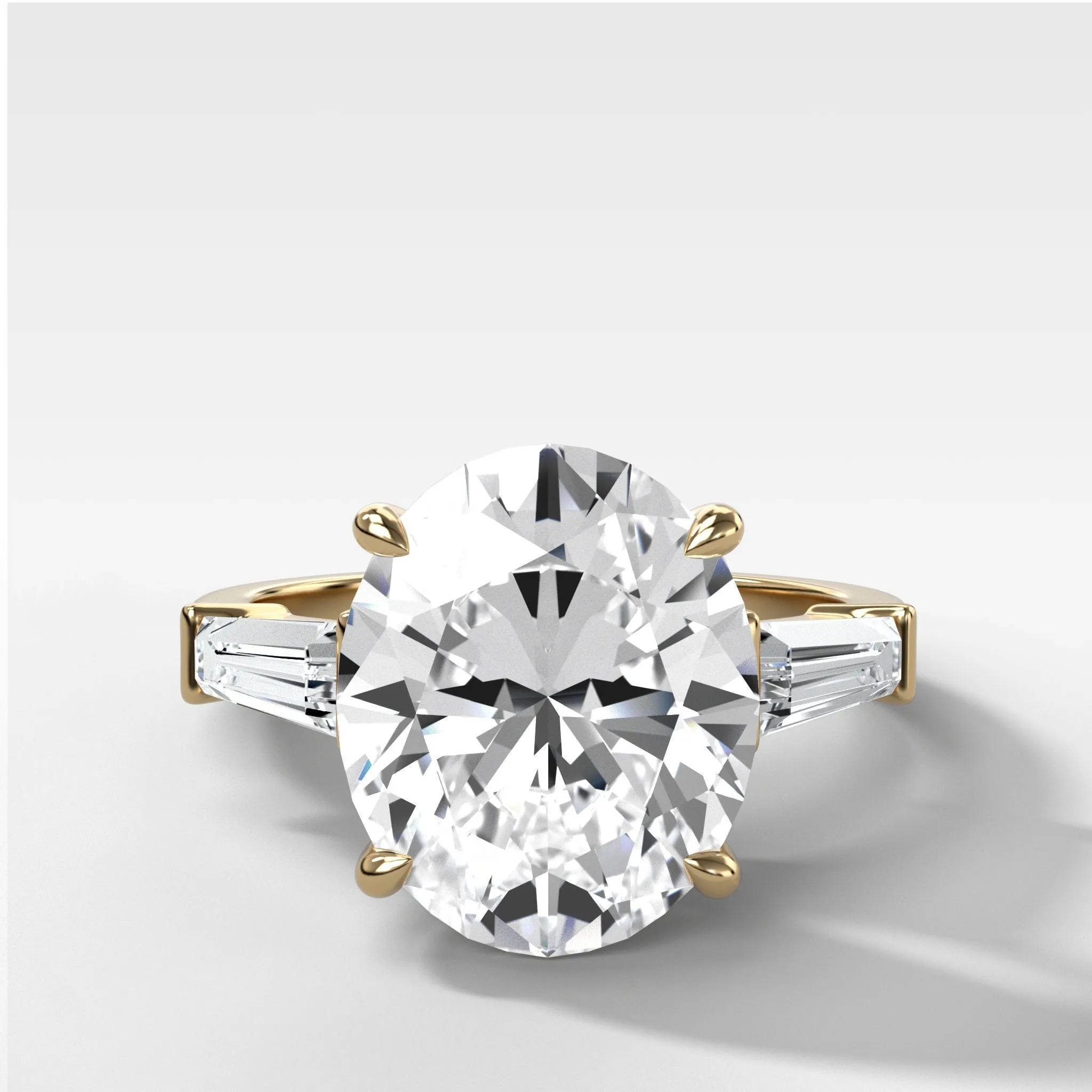 Translunar Tapered Baguette Engagement Ring With Oval Cut Diamond