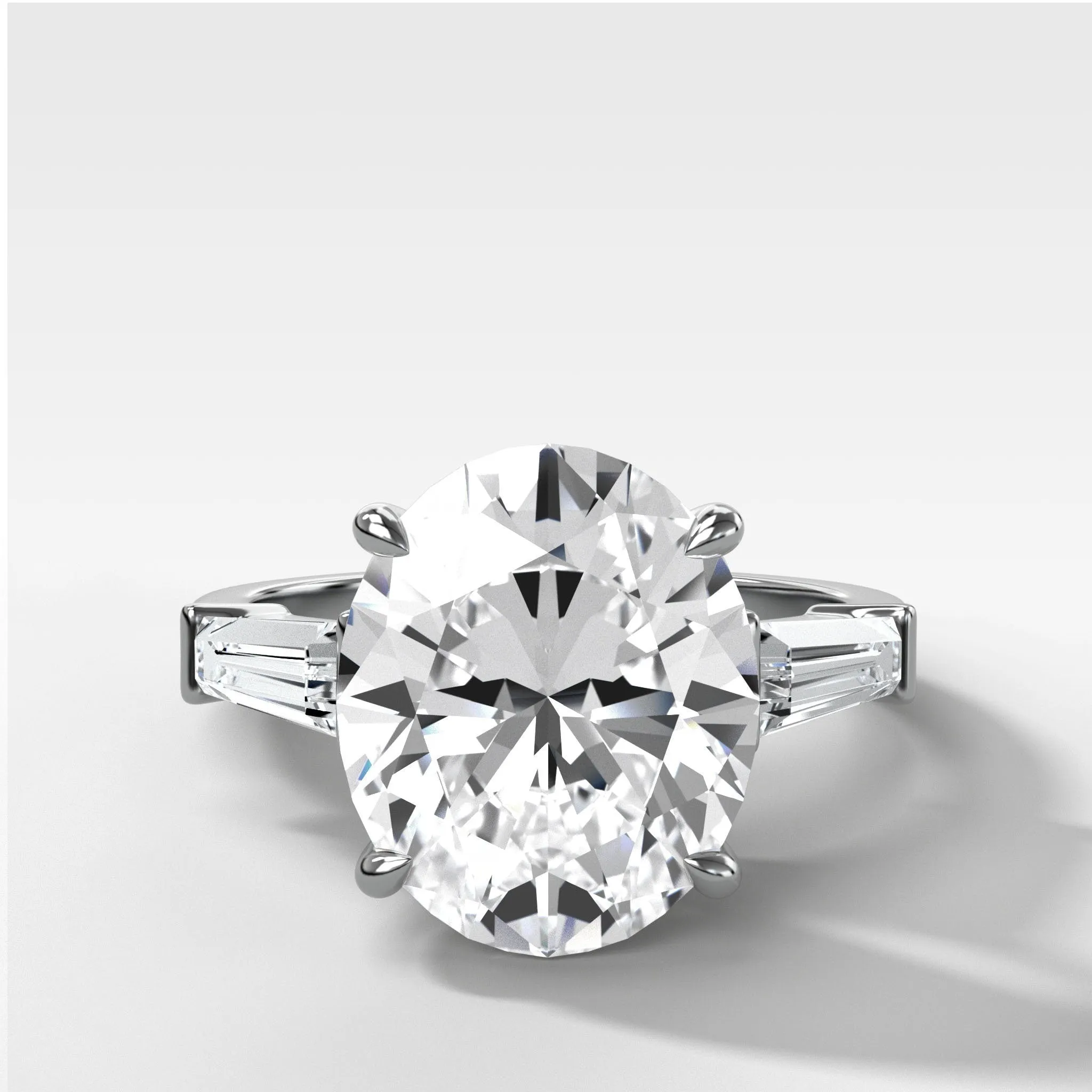 Translunar Tapered Baguette Engagement Ring With Oval Cut Diamond
