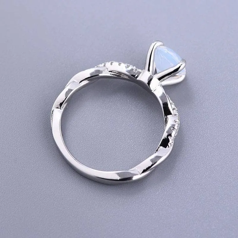 Twist Round Cut Moonstone Engagement Ring